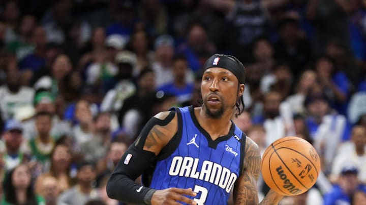 Apr 27, 2025; Orlando, Florida, USA; Orlando Magic guard Kentavious Caldwell-Pope (3) controls the ball against the Boston Celtics in the second quarter during game four of first round for the 2025 NBA Playoffs at Kia Center. Mandatory Credit: Nathan Ray Seebeck-Imagn Images