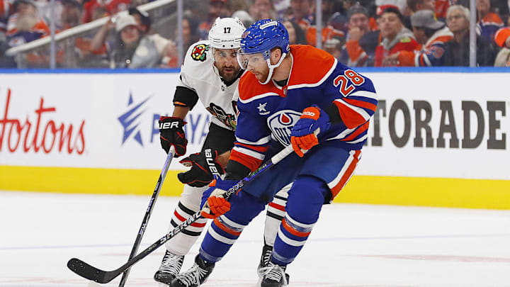 Edmonton Oilers forward Connor Brown (28) and Chicago Blackhawks forward Nick Foligno (17)