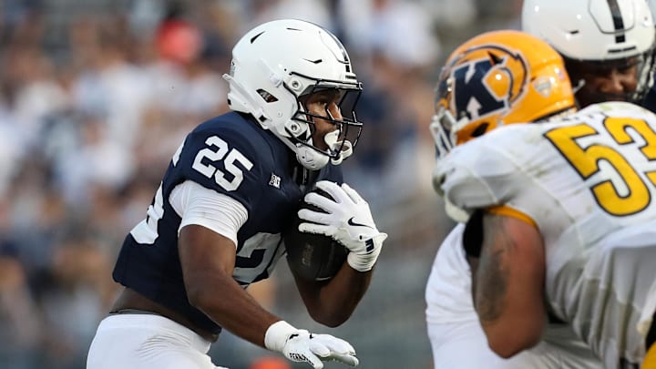 Penn State freshman running back Quinton Martin Jr. carries the football during the fourth quarter against the Kent State Golden Flashes at Beaver Stadium.
