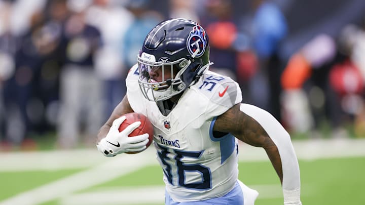 Nov 24, 2024; Houston, Texas, USA; Tennessee Titans special teams Julius Chestnut (36) returns the kick off against the Houston Texans in the first quarter at NRG Stadium. 