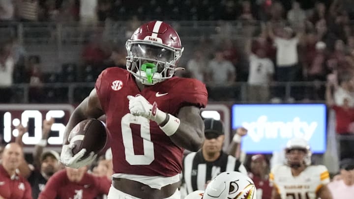 Sep 6, 2025; Tuscaloosa, Alabama, USA;  Alabama running back AK Dear (0) outruns a tackle attempt by UL Monroe defensive back Carl Fauntroy (8) on his way to a long touchdown run at Saban Field at Bryant-Denny Stadium. Alabama defeated UL Monroe 73-0. Mandatory Credit: Gary Cosby Jr.-Imagn Images