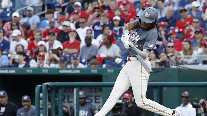 Sep 28, 2024; Washington, District of Columbia, USA; Washington Nationals outfielder James Wood (29) hits a two run home run against the Philadelphia Phillies during the sixth inning at Nationals Park. | Geoff Burke-Imagn Images