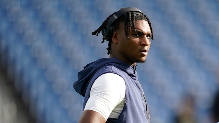 Tennessee Titans quarterback Cam Ward (1) warms up before the game against the New Orleans Saints at Nissan Stadium in Nashville, Tenn., Sunday, Dec. 28, 2025.