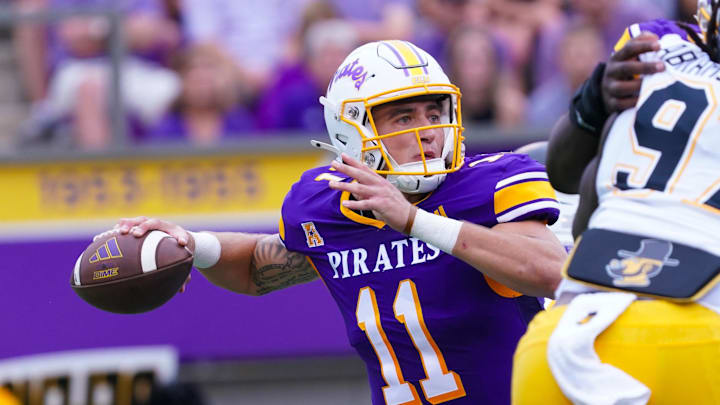 Sep 14, 2024; Greenville, North Carolina, USA; East Carolina Pirates quarterback Jake Garcia (11) throws the ball against the Appalachian State Mountaineers during the first half at Dowdy-Ficklen Stadium. Mandatory Credit: James Guillory-Imagn Images Sep 14, 2024; Greenville, North Carolina, USA; East Carolina Pirates quarterback Jake Garcia (11) throws the ball against the Appalachian State Mountaineers during the first half at Dowdy-Ficklen Stadium. Mandatory Credit: James Guillory-Imagn Images