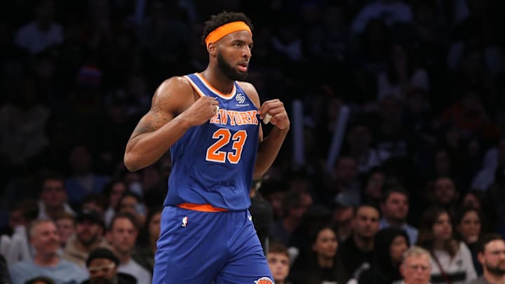 Dec 26, 2019; Brooklyn, New York, USA; New York Knicks center Mitchell Robinson (23) reacts during the third quarter against the Brooklyn Nets at Barclays Center. Mandatory Credit: Brad Penner-Imagn Images
