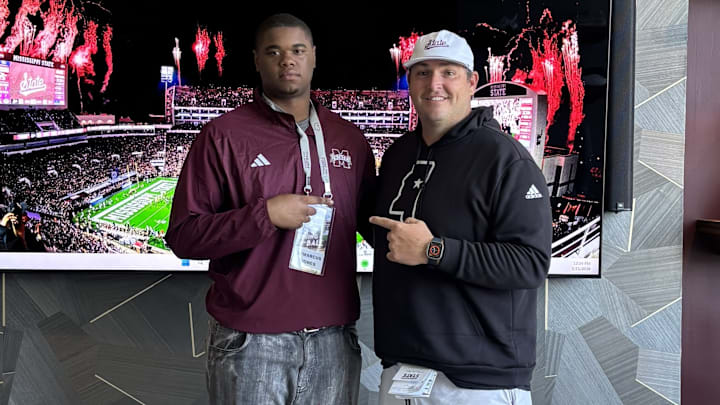 Callaway (Miss.) offensive tackle Li'Marcus Jones with Mississippi State head coach Jeff Lebby.