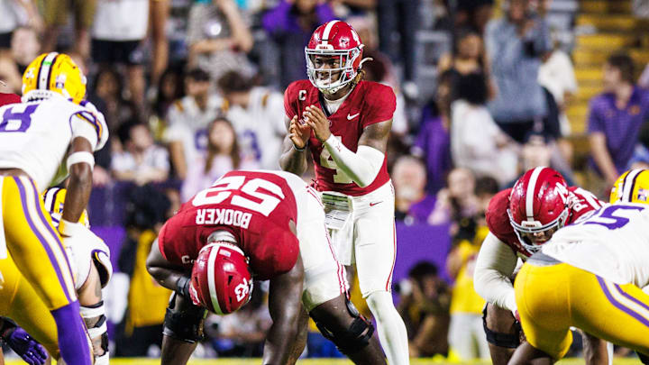 Nov 9, 2024; Baton Rouge, Louisiana, USA; Alabama Crimson Tide quarterback Jalen Milroe (4) calls for the ball against LSU Tigers safety Major Burns (8) during the second half at Tiger Stadium. Mandatory Credit: Stephen Lew-Imagn Images Nov 9, 2024; Baton Rouge, Louisiana, USA; Alabama Crimson Tide quarterback Jalen Milroe (4) calls for the ball against LSU Tigers safety Major Burns (8) during the second half at Tiger Stadium. Mandatory Credit: Stephen Lew-Imagn Images