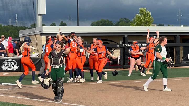 Pitcher Cami Carter, right, and catcher Dani Goodman walk back dejected as Carterville players celebrate just after scoring the winning run in the IHSA Class 2A softball state title game Saturday, June 1, 2024, in Peoria. North Boone took second in the state. Pitcher Cami Carter, right, and catcher Dani Goodman walk back dejected as Carterville players celebrate just after scoring the winning run in the IHSA Class 2A softball state title game Saturday, June 1, 2024, in Peoria. North Boone took second in the state.