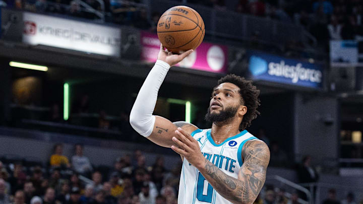 Nov 19, 2025; Indianapolis, Indiana, USA; Charlotte Hornets forward Miles Bridges (0) shoots the ball in the first half against the Indiana Pacers at Gainbridge Fieldhouse. 