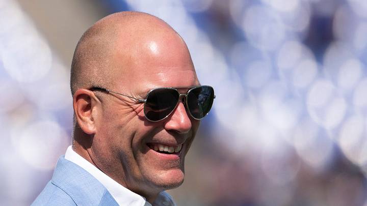 Sep 15, 2024; Baltimore, Maryland, USA;  Baltimore Ravens general manager Eric DeCosta walks across the the field before the game against the Las Vegas Raiders at M&T Bank Stadium. Mandatory Credit: Tommy Gilligan-Imagn Images