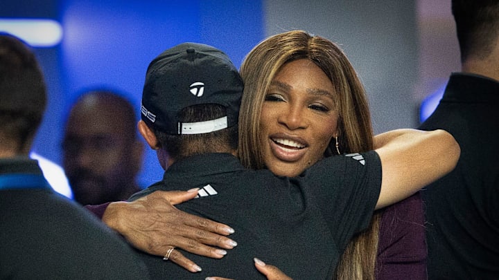 Serena Williams hugs Collin Morikawa of Los Angeles Golf Club. Williams and her husband, Reddit co-founder Alexis Ohanian, co-own the the team, after a TGL match at SoFi Center on February 4, 2025, in Palm Beach Gardens, Florida.