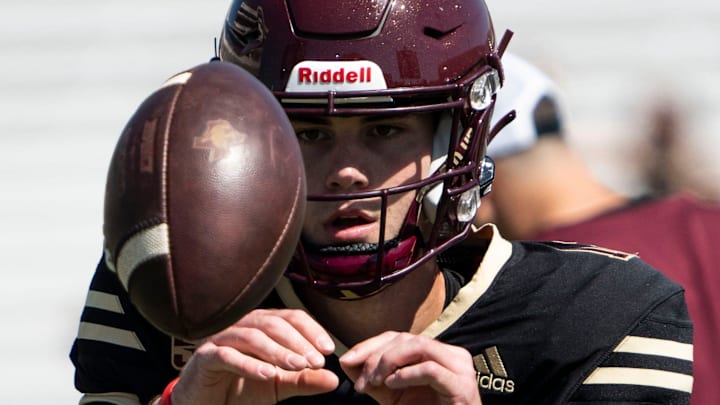 Quarterback CJ Rogers (12) catches the ball during warmup drills at the Texas State football spring game at Bobcat Stadium on Saturday, April 22, 2023.
