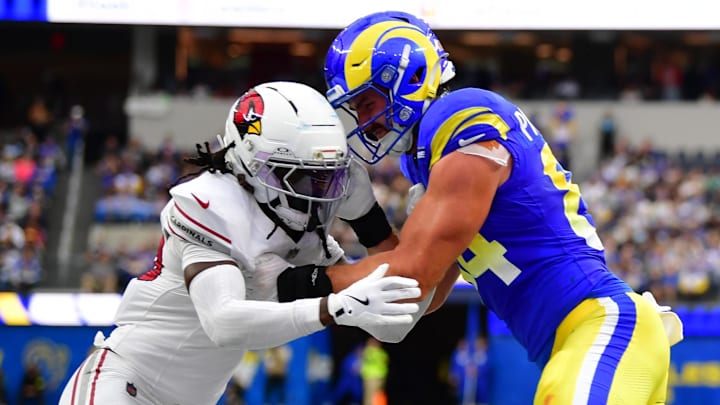 Jan 4, 2026; Inglewood, California, USA; Los Angeles Rams wide receiver Puka Nacua (12) is tackled short of the goal line against the Arizona Cardinals during the first half at SoFi Stadium. Mandatory Credit: Gary A. Vasquez-Imagn Images Jan 4, 2026; Inglewood, California, USA; Los Angeles Rams wide receiver Puka Nacua (12) is tackled short of the goal line against the Arizona Cardinals during the first half at SoFi Stadium. Mandatory Credit: Gary A. Vasquez-Imagn Images