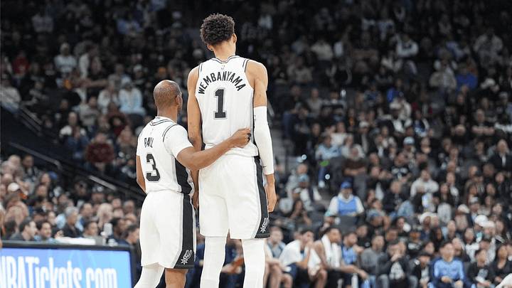 Jan 17, 2025; San Antonio, Texas, USA; San Antonio Spurs guard Chris Paul (3) and center Victor Wembanyama (1) at midcourt during the first half against the Memphis Grizzlies at Frost Bank Center. Jan 17, 2025; San Antonio, Texas, USA; San Antonio Spurs guard Chris Paul (3) and center Victor Wembanyama (1) at midcourt during the first half against the Memphis Grizzlies at Frost Bank Center.