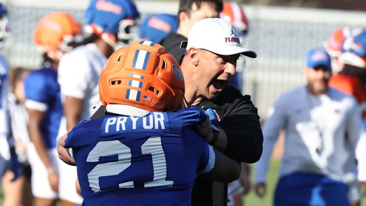 Florida running back Evan Pryor (21) works out Florida head coach Jon Sumrall looks on during spring football practice at Heavener Football Center in Gainesville, FL on Thursday, March 5, 2026. [Alan Youngblood/Gainesville Sun]