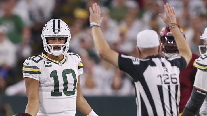 Sep 11, 2025; Green Bay, Wisconsin, USA; Green Bay Packers quarterback Jordan Love (10) gestures to referee Brad Rogers (126) after the Packers are called for a penalty during a game against the Washington Commanders at Lambeau Field. Mandatory Credit: Tork Mason-USA TODAY Network via Imagn Images Sep 11, 2025; Green Bay, Wisconsin, USA; Green Bay Packers quarterback Jordan Love (10) gestures to referee Brad Rogers (126) after the Packers are called for a penalty during a game against the Washington Commanders at Lambeau Field. Mandatory Credit: Tork Mason-USA TODAY Network via Imagn Images