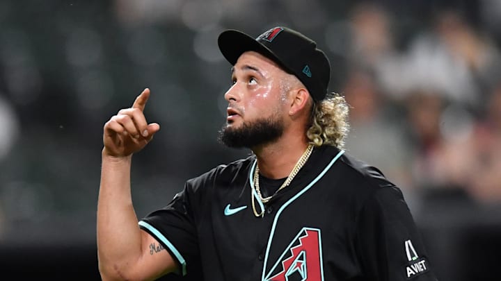 Jun 24, 2025; Chicago, Illinois, USA; Arizona Diamondbacks pitcher Juan Morillo (67) reacts after ending the eighth inning against the Chicago White Sox at Rate Field. Mandatory Credit: Patrick Gorski-Imagn Images