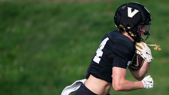 Vanderbilt University football freshman wide receiver Owen Cabell (84) runs after a catch during practice at Vanderbilt University’s McGugin Center practice fields Tuesday, March 31, 2026.