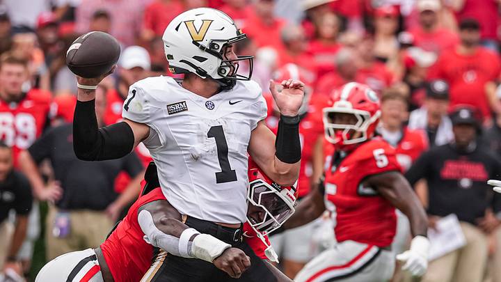 Oct 3, 2026; Athens, Georgia, USA; Vanderbilt Commodores quarterback Blaze Berlowitz (1) is hit by Georgia Bulldogs linebacker Quintavius Johnson (3) during the first quarter at Sanford Stadium. Mandatory Credit: Dale Zanine-Imagn Images Oct 3, 2026; Athens, Georgia, USA; Vanderbilt Commodores quarterback Blaze Berlowitz (1) is hit by Georgia Bulldogs linebacker Quintavius Johnson (3) during the first quarter at Sanford Stadium. Mandatory Credit: Dale Zanine-Imagn Images