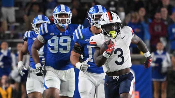 Nov 15, 2025; Durham, North Carolina, USA;  Virginia Cavaliers running back J'Mari Taylor (3) runs the ball past the Duke Blue Devils defense for a touchdown during the third quarter at Wallace Wade Stadium. Mandatory Credit: Zachary Taft-Imagn Images
