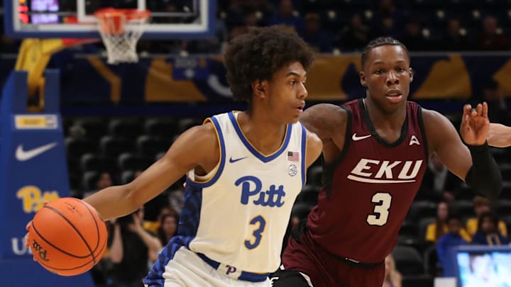 Dec 11, 2024; Pittsburgh, Pennsylvania, USA;  Pittsburgh Panthers guard Brandin Cummings (3) dribbles the ball as Eastern Kentucky Colonels guard George Kimble III (right) defends during the first half at the Petersen Events Center. Mandatory Credit: Charles LeClaire-Imagn Images