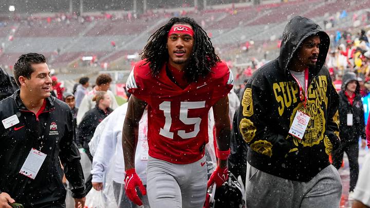 Wide receiver Chris Henry Jr. (15) walks off the field in the rain after the Ohio State football spring game at Ohio Stadium on Saturday, April 18, 2026 in Columbus, Ohio. Wide receiver Chris Henry Jr. (15) walks off the field in the rain after the Ohio State football spring game at Ohio Stadium on Saturday, April 18, 2026 in Columbus, Ohio.