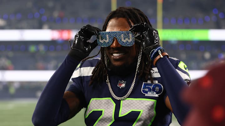 Jan 17, 2026; Seattle, WA, USA; Seattle Seahawks cornerback Riq Woolen (27) celebrates following an NFC Divisional Round game against the San Francisco 49ers at Lumen Field. 