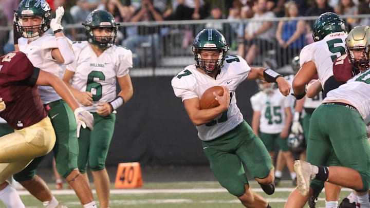 Monrovia's Noah Bryant finds a hole in the defensive line as the Lutheran Saints took on the Monrovia Bulldogs in IHSAA football, Oct 4, 2024; Indianapolis, IN, USA; at Lutheran High School.