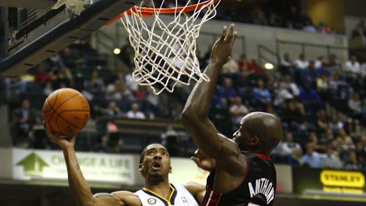 Oct 30, 2009; Indianapolis, IN, USA; Indiana Pacers forward Luther Head (13) shoots while being covered by the Miami Heat center Joel Anthony (50) in the third quarter at Conseco Fieldhouse in Indianapolis, IN. Miami won 96-83. Mandatory Credit: Frank Victores-Imagn Images