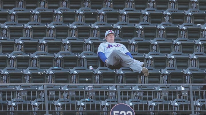 Apr 26, 2026; New York City, New York, USA;  A fan sits alone in the sixth inning of the game between the Colorado Rockies and the New York Mets at Citi Field. Mandatory Credit: Wendell Cruz-Imagn Images
