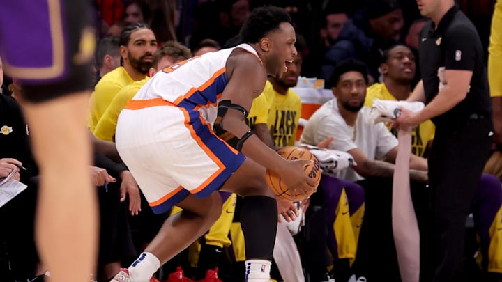 Feb 1, 2025; New York, New York, USA; New York Knicks forward OG Anunoby (8) reacts to an apparent injury during the third quarter against the Los Angeles Lakers at Madison Square Garden. Mandatory Credit: Brad Penner-Imagn Images