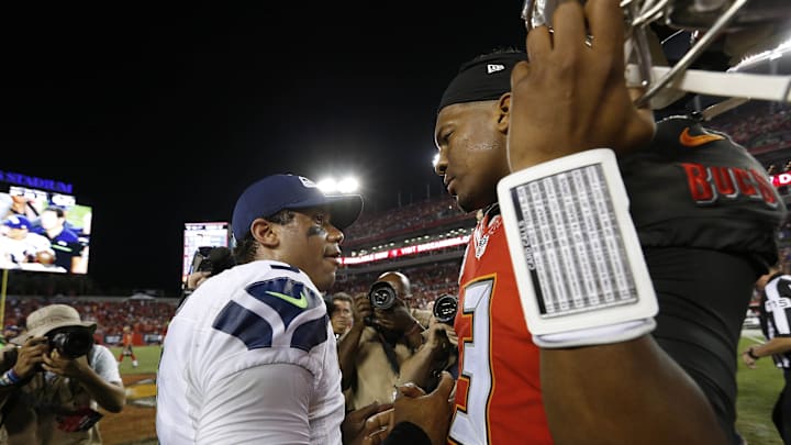 Nov 27, 2016; Tampa, FL, USA; Tampa Bay Buccaneers quarterback Jameis Winston (3) and Seattle Seahawks quarterback Russell Wilson (3) greet after the game during at Raymond James Stadium. Tampa Bay Buccaneers defeated the Seattle Seahawks 14-5. Nov 27, 2016; Tampa, FL, USA; Tampa Bay Buccaneers quarterback Jameis Winston (3) and Seattle Seahawks quarterback Russell Wilson (3) greet after the game during at Raymond James Stadium. Tampa Bay Buccaneers defeated the Seattle Seahawks 14-5.