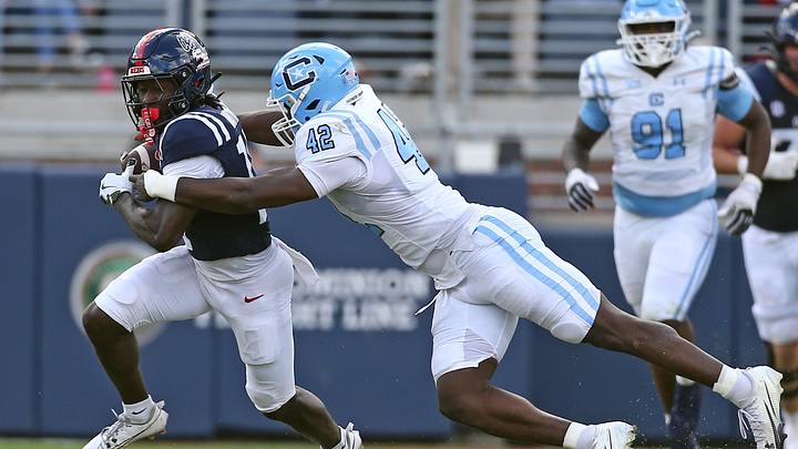 Nov 8, 2025; Oxford, Mississippi, USA; Mississippi Rebels wide receiver Winston Watkins (17) runs after a catch as The Citadel Bulldogs linebacker Darryle Ware (42) makes the tackle during the second quarter at Vaught-Hemingway Stadium. Mandatory Credit: Petre Thomas-Imagn Images Nov 8, 2025; Oxford, Mississippi, USA; Mississippi Rebels wide receiver Winston Watkins (17) runs after a catch as The Citadel Bulldogs linebacker Darryle Ware (42) makes the tackle during the second quarter at Vaught-Hemingway Stadium. Mandatory Credit: Petre Thomas-Imagn Images