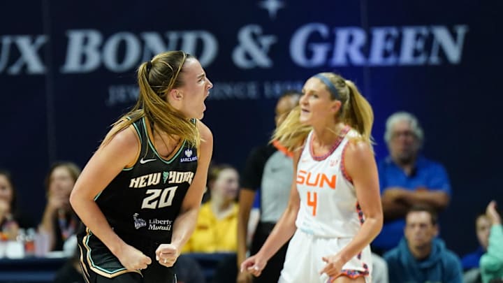 Aug 3, 2025; Uncasville, Connecticut, USA; New York Liberty guard Sabrina Ionescu (20) reacts after her basket against the Connecticut Sun in the first half at Mohegan Sun Arena. Mandatory Credit: David Butler II-Imagn Images