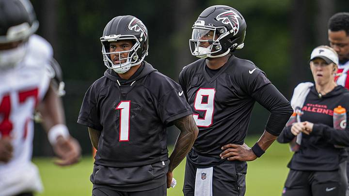 Jun 16, 2026; Atlanta, GA, USA; Atlanta Falcons quarterbacks Tua Tagovailoa (1) and  Michael Penix Jr. (9) on the field during Minicamp. Mandatory Credit: Dale Zanine-Imagn Images