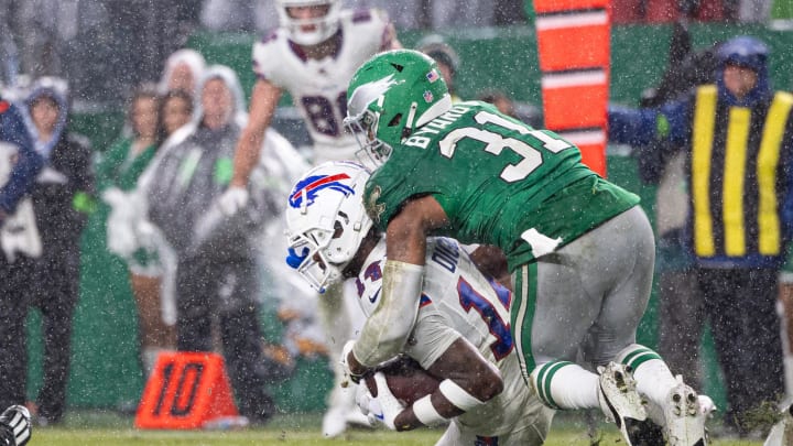 Kevin Byard stops Stefon Diggs following a reception in a December game, after being traded by Tennessee to Philadelphia.