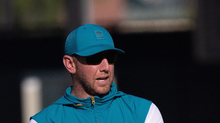 Jacksonville Jaguars Head Coach Liam Coen, left, talks with Assistant Strength and Conditioning Coach Julian Whitehead during the Jacksonville Jaguars’ 18th and final training camp practice at Miller Electric Center in Jacksonville, Fla. Wednesday August 20, 2025. [Doug Engle/Florida Times-Union]