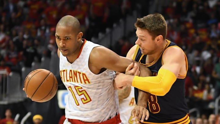 May 6, 2016; Atlanta, GA, USA; Atlanta Hawks center Al Horford (15) is fouled by Cleveland Cavaliers guard Matthew Dellavedova (8) during the first half in game three of the second round of the NBA Playoffs at Philips Arena. Mandatory Credit: Dale Zanine-Imagn Images