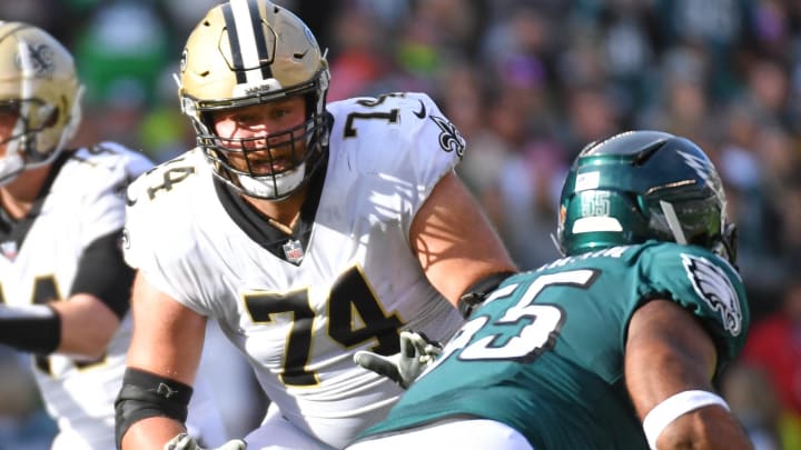 Jan 1, 2023; Philadelphia, Pennsylvania, USA; New Orleans Saints offensive tackle James Hurst (74) blocks against the Philadelphia Eagles at Lincoln Financial Field. Mandatory Credit: Eric Hartline-USA TODAY Sports