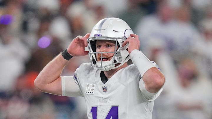 Dec 16, 2024; Minneapolis, Minnesota, USA; Minnesota Vikings quarterback Sam Darnold (14) at the line of scrimmage against the Chicago Bears in the third quarter at U.S. Bank Stadium. Mandatory Credit: Brad Rempel-Imagn Images Dec 16, 2024; Minneapolis, Minnesota, USA; Minnesota Vikings quarterback Sam Darnold (14) at the line of scrimmage against the Chicago Bears in the third quarter at U.S. Bank Stadium. Mandatory Credit: Brad Rempel-Imagn Images