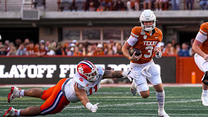 Texas Longhorns quarterback Quinn Ewers (3) runs the ball during the game against Clemson in the first round of the College Football Playoffs at Darrell K Royal-Texas Memorial Stadium on Saturday, Dec. 21, 2024.