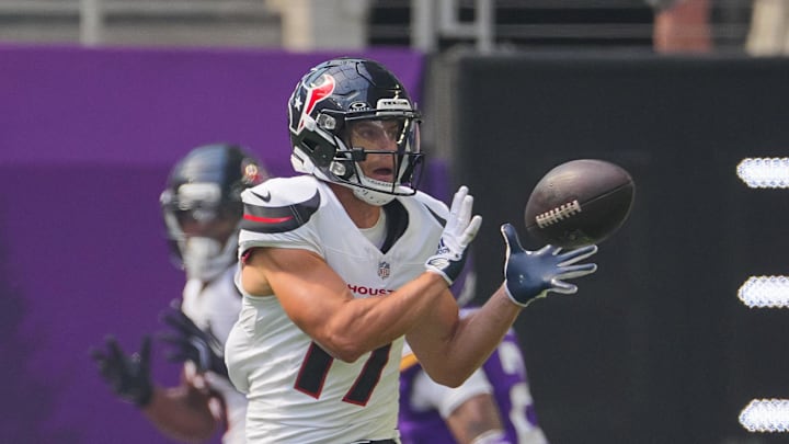 Aug 9, 2025; Minneapolis, Minnesota, USA; Houston Texans wide receiver Braxton Berrios (17) catches a pass for a touchdown against the Minnesota Vikings in the first quarter at U.S. Bank Stadium. Mandatory Credit: Brad Rempel-Imagn Images
