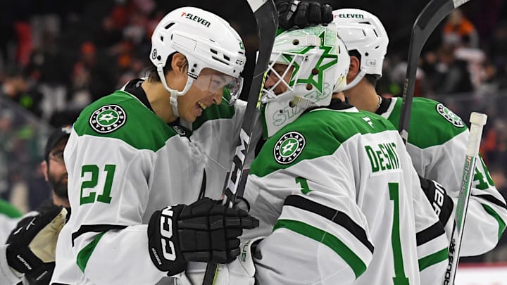 Jan 9, 2025; Philadelphia, Pennsylvania, USA; Dallas Stars left wing Jason Robertson (21) and goaltender Casey DeSmith (1) celebrate win against the Philadelphia Flyers at Wells Fargo Center. Mandatory Credit: Eric Hartline-Imagn Images