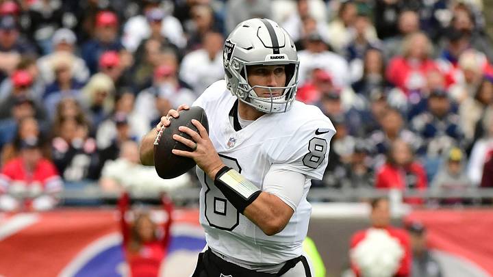 Las Vegas Raiders quarterback Kirk Cousins (8) drops back to pass against the New England Patriots during the second quarter at Gillette Stadium. Las Vegas Raiders quarterback Kirk Cousins (8) drops back to pass against the New England Patriots during the second quarter at Gillette Stadium.