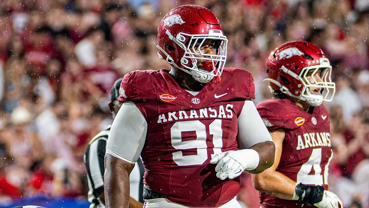 Arkansas Razorbacks defensive lineman Carlon Jones after a play in the first half against Tulsa. Arkansas Razorbacks defensive lineman Carlon Jones after a play in the first half against Tulsa.
