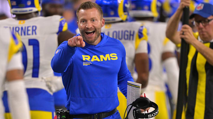 Nov 23, 2025; Inglewood, California, USA; Los Angeles Rams head coach Sean McVay congratulates cornerback Cobie Durant (14) after an interception for a touchdown in the first half against the Tampa Bay Buccaneers at SoFi Stadium. 