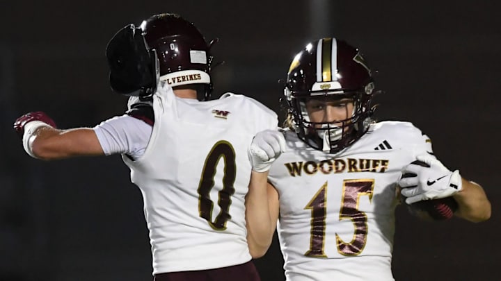 Woodruff Wolverines Kayden Barnaby (0) and Woodruff Wolverines Rhylan Renfrow (15) celebrate after a touchdown Friday, Sept. 12, 2025 during the SCHSL football game against the Woodmont Wildcats at Woodmont High School in Piedmont, South Carolina.