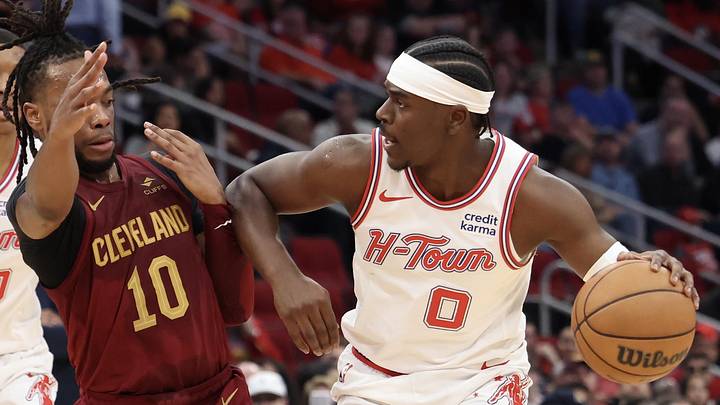 Mar 16, 2024; Houston, Texas, USA; Houston Rockets guard Aaron Holiday (0) dribbles against Cleveland Cavaliers guard Darius Garland (10) in the second quarter at Toyota Center. Mandatory Credit: Thomas Shea-USA TODAY Sports Mar 16, 2024; Houston, Texas, USA; Houston Rockets guard Aaron Holiday (0) dribbles against Cleveland Cavaliers guard Darius Garland (10) in the second quarter at Toyota Center. Mandatory Credit: Thomas Shea-USA TODAY Sports