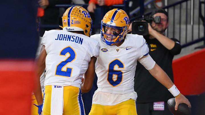 Oct 18, 2025; Syracuse, New York, USA; Pittsburgh Panthers quarterback Mason Heintschel (6) celebrates his touchdown run with wide receiver Kenny Johnson (2) against the Syracuse Orange during the first half at the JMA Wireless Dome. Mandatory Credit: Rich Barnes-Imagn Images Oct 18, 2025; Syracuse, New York, USA; Pittsburgh Panthers quarterback Mason Heintschel (6) celebrates his touchdown run with wide receiver Kenny Johnson (2) against the Syracuse Orange during the first half at the JMA Wireless Dome. Mandatory Credit: Rich Barnes-Imagn Images