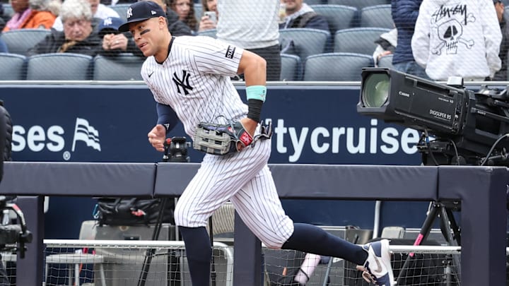 Apr 13, 2025; Bronx, New York, USA;  New York Yankees right fielder Aaron Judge (99) takes the field against the San Francisco Giants at Yankee Stadium.